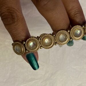 Elegant Gold-Toned Bracelet with Iridescent Accents